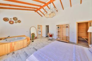 a large bathroom with a tub and a bed at Golden Lighthouse Hotel in Patara +37 photos