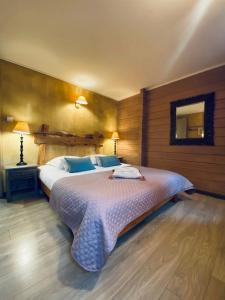 Postel nebo postele na pokoji v ubytování Le Chalet d'Etienne