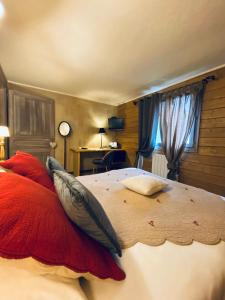 Postel nebo postele na pokoji v ubytování Le Chalet d'Etienne