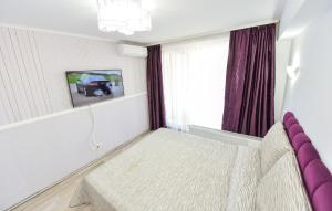 Krevet ili kreveti u jedinici u okviru objekta Ben Yehuda - Shabbat Friendly Apartments