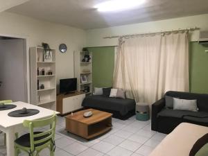 Posezení v ubytování Istos Apartment