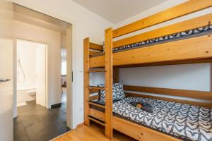 A bed or beds in a room at FaWa Apartments "Family"