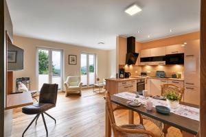 Kuchyň nebo kuchyňský kout v ubytování Ferienwohnungen Schiltenstein