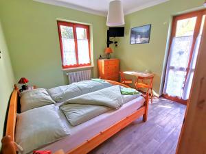 Un pat sau paturi într-o cameră la ManuEbbasta