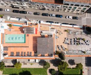 an overhead view of a building with a parking lot at Hotel Kraft in Florence