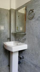 Vonios kambarys apgyvendinimo įstaigoje Gems Garden Guest House