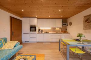 Kuchyň nebo kuchyňský kout v ubytování Ferienwohnung Serlesblick + 18 fotografií