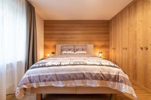 Postel nebo postele na pokoji v ubytování Haus Mirador by Zermatt Premium Apartments