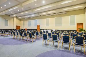 a room with rows of chairs in a hall at JOIA Rose Hall by Iberostar - Adults Only All Inclusive Resort in Montego Bay +84 photos