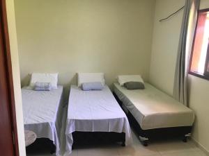 Postel nebo postele na pokoji v ubytování Casa de praia completa em Milagres