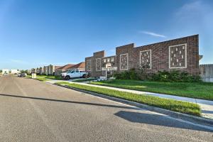 a brick building on the side of a road at Sleek Edinburg Home Near Shopping and Hiking! in Edinburg