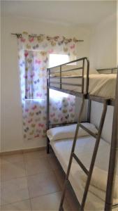 Postel nebo postele na pokoji v ubytování APARTAMENTO HABANERAS A 150M DEL MAR