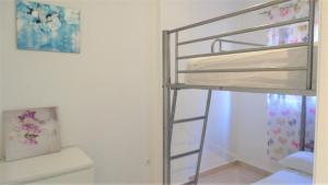 Postel nebo postele na pokoji v ubytování APARTAMENTO HABANERAS A 150M DEL MAR