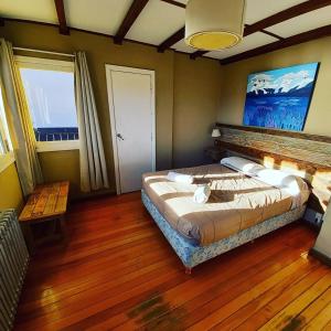 Postel nebo postele na pokoji v ubytování Bariloche Hostel