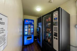 a pepsi machine and a soda vending machine at Red Roof Inn Charlottesville in Charlottesville