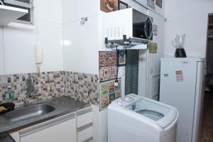 A cozinha ou cozinha compacta de Proximo a Ipanema e Arpoador,confortavel e util!