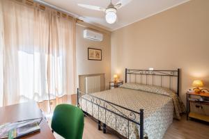 Posteľ alebo postele v izbe v ubytovaní Hotel Trasimeno