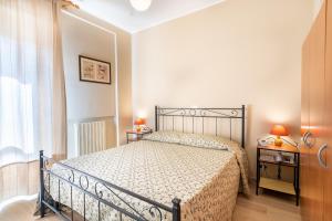 Posteľ alebo postele v izbe v ubytovaní Hotel Trasimeno
