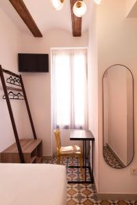 TV a/nebo společenská místnost v ubytování Hotel 19-30 Valencia