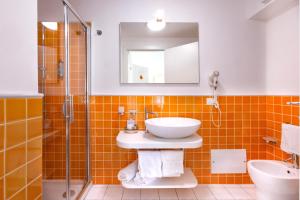 Kúpeľňa v ubytovaní Janas Hotel