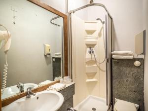 Kúpeľňa v ubytovaní Hotel Trasimeno