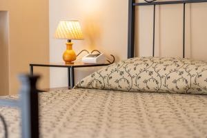 Posteľ alebo postele v izbe v ubytovaní Hotel Trasimeno
