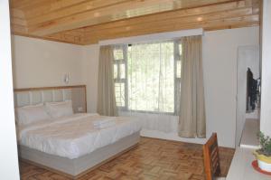 Кровать или кровати в номере Kunden Village Resort