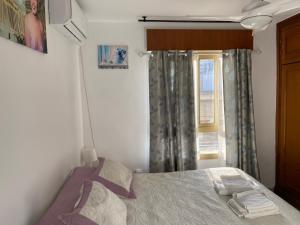 Posteľ alebo postele v izbe v ubytovaní Málaga Centro habitaciones privada en apartamento compartidos