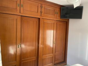 Televízia a/alebo spoločenská miestnosť v ubytovaní Málaga Centro habitaciones privada en apartamento compartidos