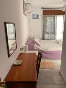 Posteľ alebo postele v izbe v ubytovaní Málaga Centro habitaciones privada en apartamento compartidos