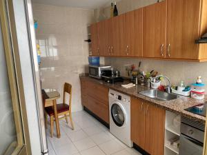 Kuchyň nebo kuchyňský kout v ubytování Málaga Centro habitaciones privada en apartamento compartidos