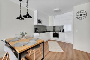 Kuchyňa alebo kuchynka v ubytovaní Wave Apartments - Powstańców Wielkopolskich
