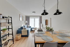 Posedenie v ubytovaní Wave Apartments - Powstańców Wielkopolskich