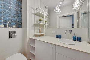 Kúpeľňa v ubytovaní Wave Apartments - Powstańców Wielkopolskich + 17 fotografií