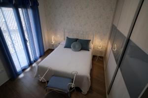 Ένα ή περισσότερα κρεβάτια σε δωμάτιο στο Amanece Monegrillo Apartamentos