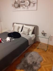 Posteľ alebo postele v izbe v ubytovaní Apartman Sweet penthouse self check-in