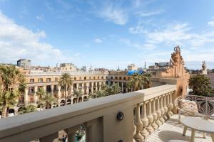 a large building with a balcony overlooking a city at Sonder DO Plaça Reial in Barcelona