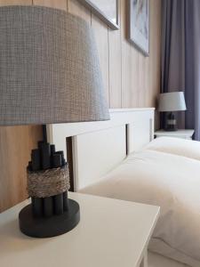 Posteľ alebo postele v izbe v ubytovaní Apartament Triventi 88 z Widokiem na Śnieżkę - 5D Apartamenty
