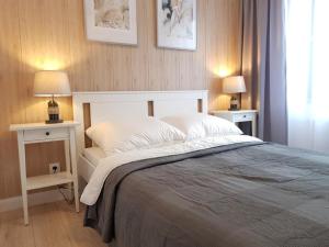 Posteľ alebo postele v izbe v ubytovaní Apartament Triventi 88 z Widokiem na Śnieżkę - 5D Apartamenty