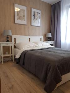 Posteľ alebo postele v izbe v ubytovaní Apartament Triventi 88 z Widokiem na Śnieżkę - 5D Apartamenty