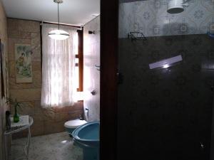 
Um banheiro em Hostel Kombi Curitiba - filial Jardim Botânico
