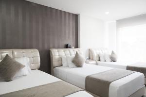 Postel nebo postele na pokoji v ubytování Solev Hotel