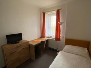 Postel nebo postele na pokoji v ubytování Hotel Bozi Dar - Excalibur