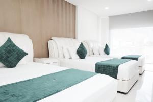 Postel nebo postele na pokoji v ubytování Solev Hotel