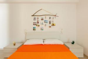 A bed or beds in a room at Casa Vacanze La Primitiva