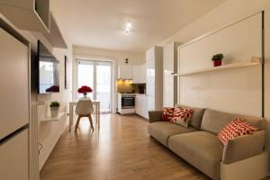 A television and/or entertainment centre at Dreamful Home - Arco della Pace