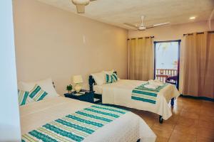 Voodi või voodid majutusasutuse La Isla Resort toas