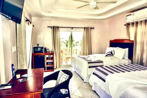Voodi või voodid majutusasutuse La Isla Resort toas
