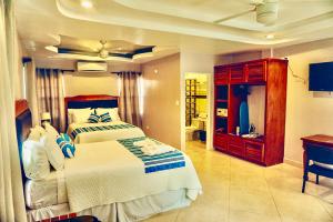 Voodi või voodid majutusasutuse La Isla Resort toas