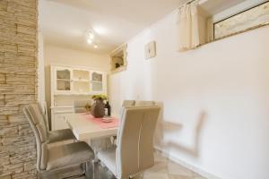 Coin salon dans l'établissement Toncica Sunny terrace with seaview and shaded BBQ area